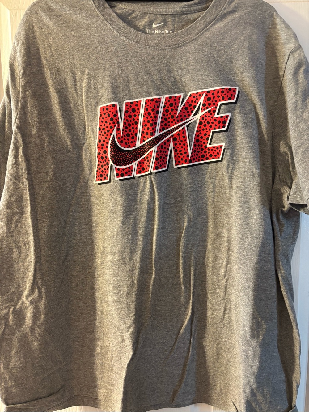 Nike Women’s Gray Long Sleeve Tee with Red Graphic